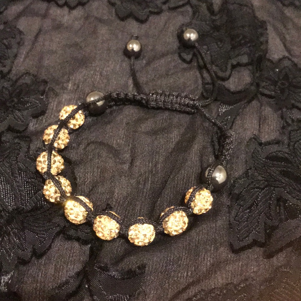 Awesome handmade bracelet e gold beads n threads